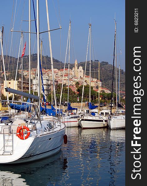 View of Cervo, medieval village in Liguria, Italy from the little harbour of San Bartolomeo.