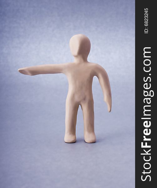 Plasticine man figure close-up isolated