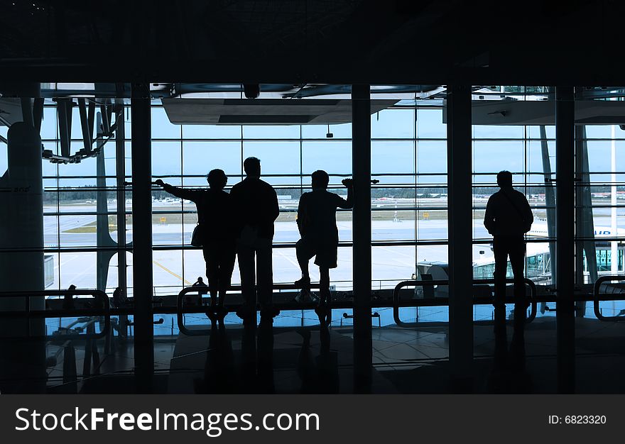 People waiting in the airport. People waiting in the airport