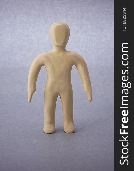 Plasticine man figure close-up isolated