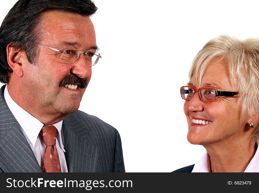 A business woman and a man looking at each other. Isolated over white. A business woman and a man looking at each other. Isolated over white.