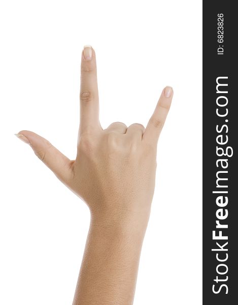 Hand showing rock on on an isolated white background. Hand showing rock on on an isolated white background