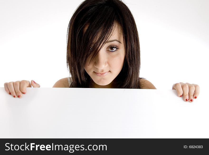 Portrait of girl holding placard on  an isolated white background