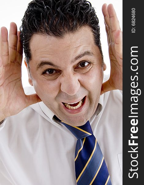 Businessman making funny face with hands on  an isolated white background