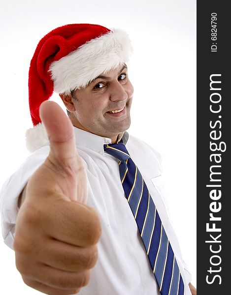 Smiling businessman with christmas hat showing approval sign on  an isolated white background