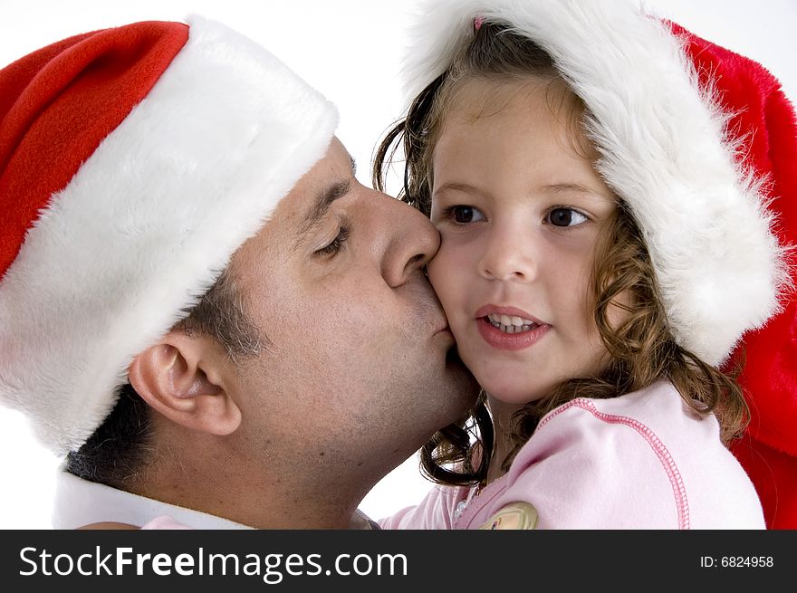 Father kissing his cute daughter. Father kissing his cute daughter