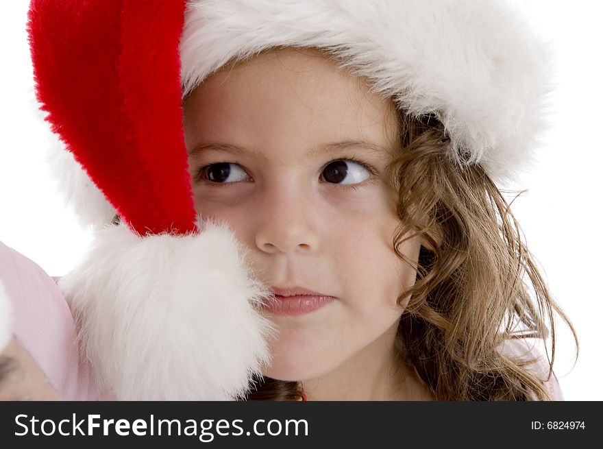 Cute little girl wearing christmas hat