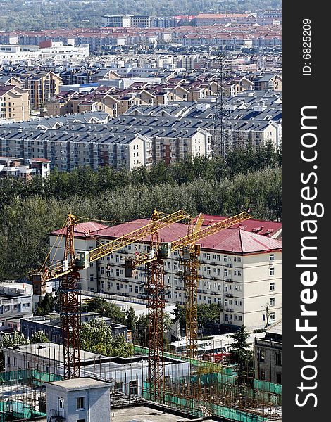 Large-scale residential area of city in construction. In Beijing China. Large-scale residential area of city in construction. In Beijing China.