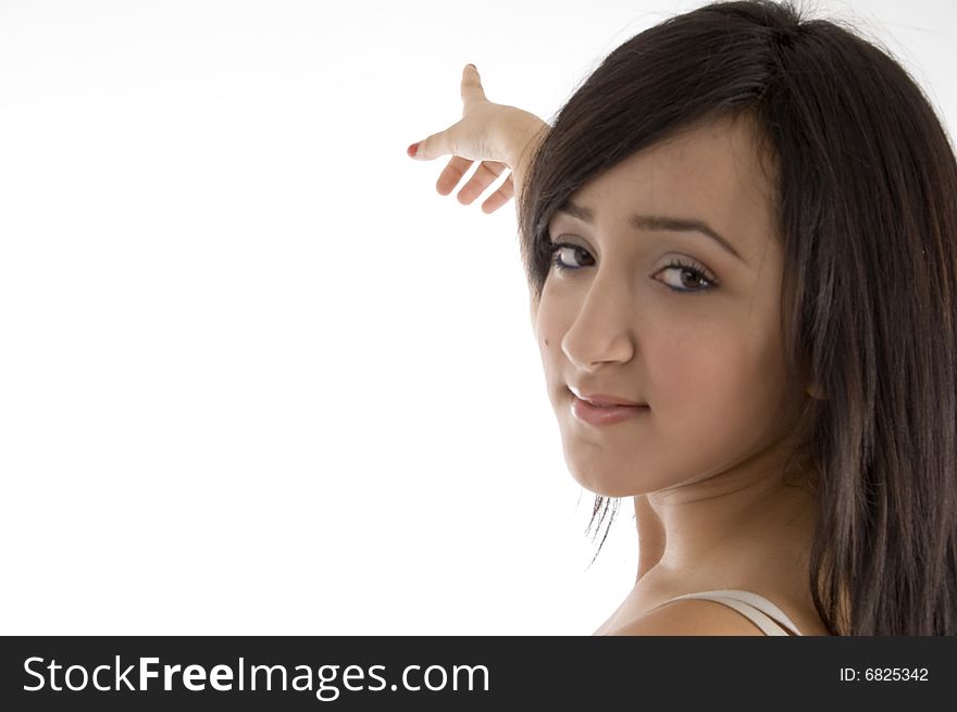 Female pointing on  an isolated white background. Female pointing on  an isolated white background