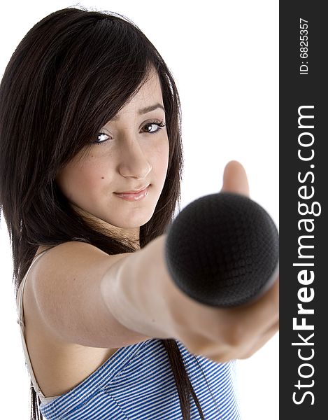 Front view of girl showing microphone on  an isolated white background