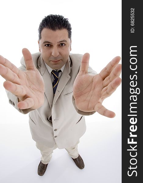 Standing businessman showing his palms on  an isolated white background