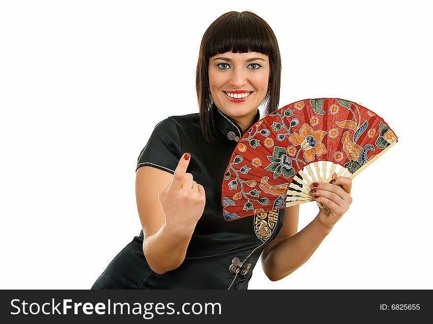 Young pretty brunette woman with fan in japanese stile invites. Young pretty brunette woman with fan in japanese stile invites
