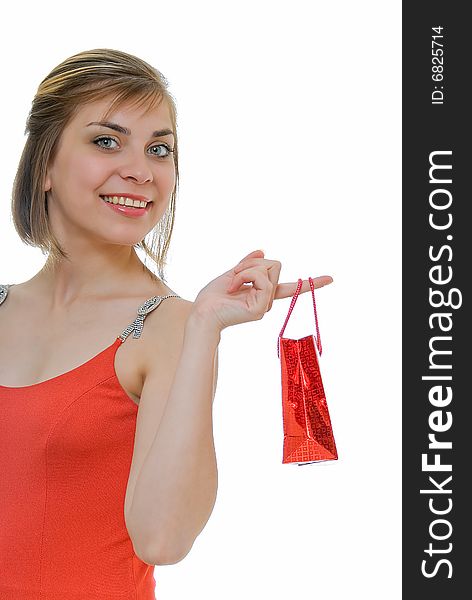 Young woman in red with red gift on white. Young woman in red with red gift on white