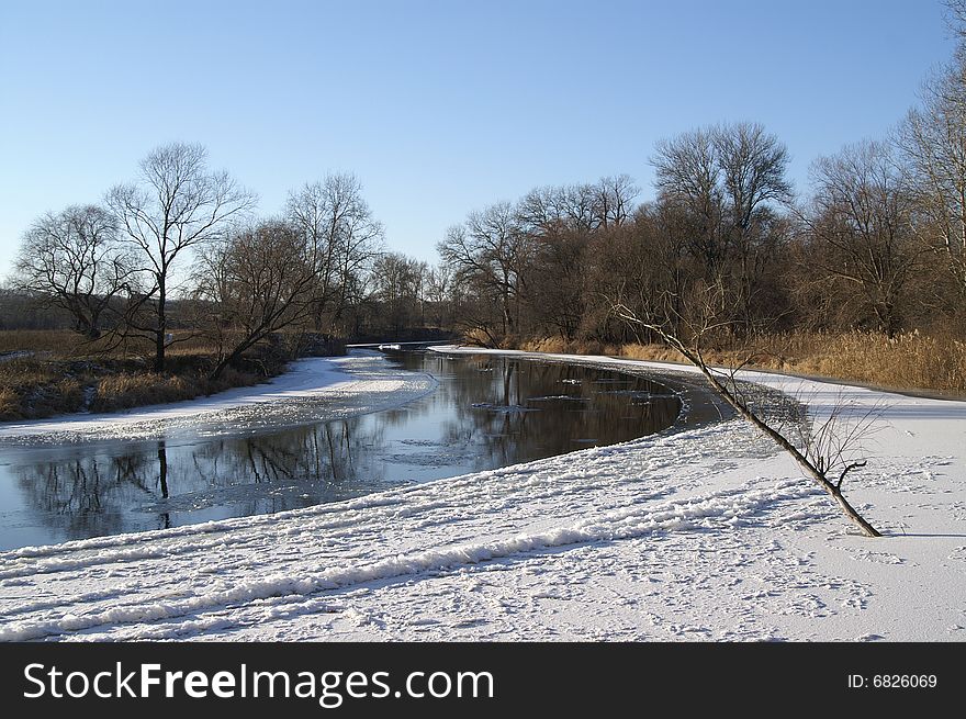 Winter Landscape. The frozen river. Winter Landscape. The frozen river