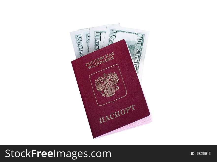 The Russian passport with the dollars enclosed in it. It is isolated on a white background. The Russian passport with the dollars enclosed in it. It is isolated on a white background.