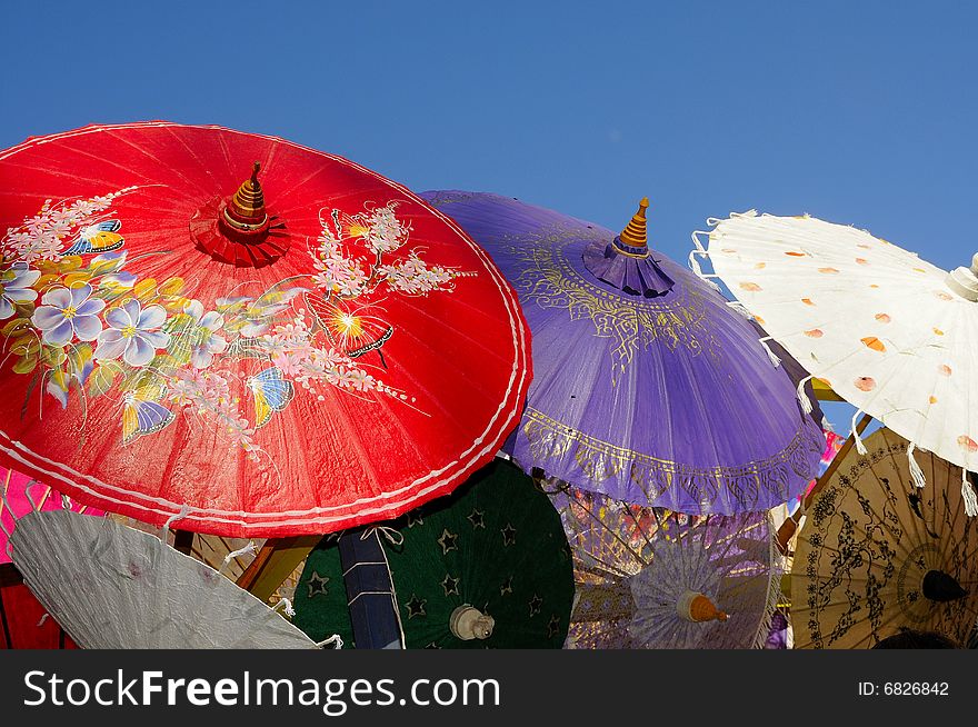 Array of Parasols in a Backdrop of Blue Sky