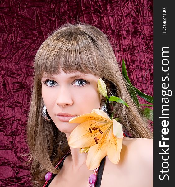 Beautiful angelic woman with a yellow flower. Beautiful angelic woman with a yellow flower