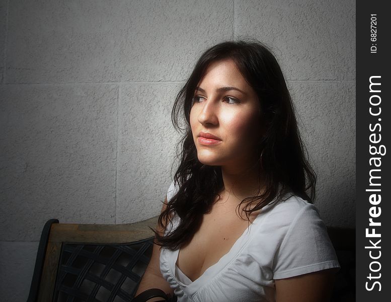 Image of a young female glancing away. Soft focus. Image of a young female glancing away. Soft focus