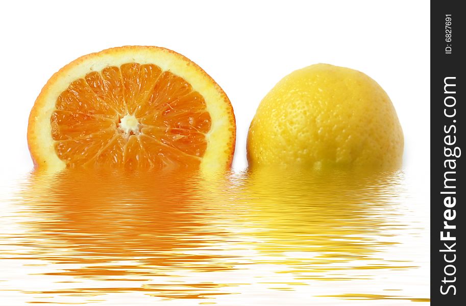Colored slice of orange and lemon with rough surface in water