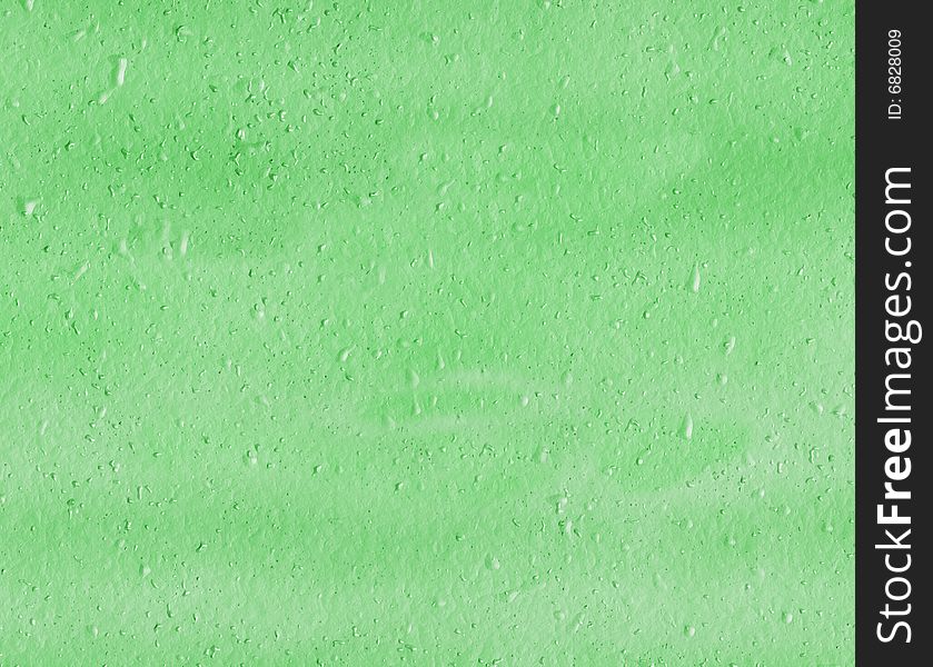 Green grungy spongy surface with some pits. Green grungy spongy surface with some pits