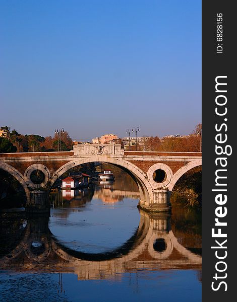 A bridge over the river Tiber in Rome. A bridge over the river Tiber in Rome