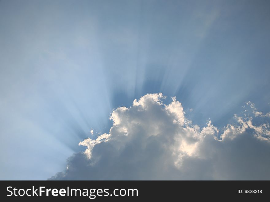 Sun Rays Bursting Through Cloud