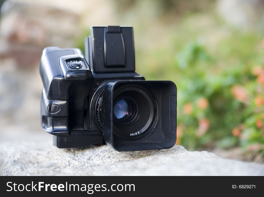 Black photo camera with good lens