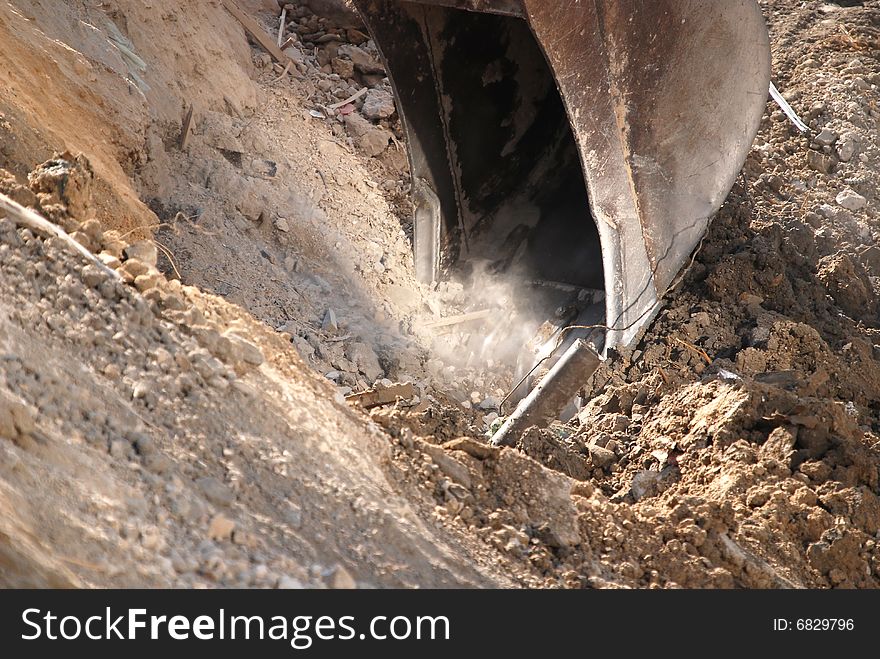 Bulldozer arm  detail detail digging ground