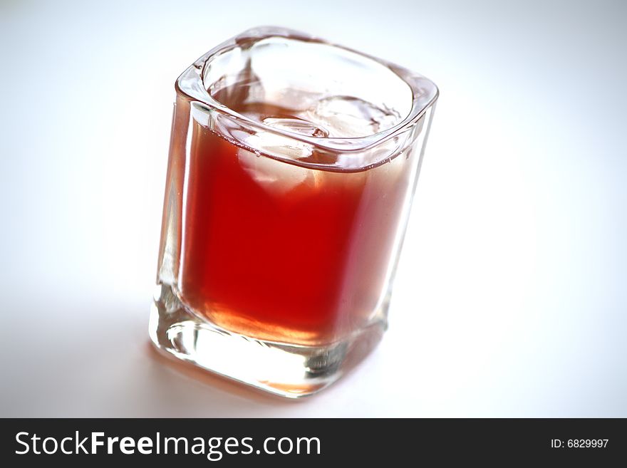 Drink with ice on white background