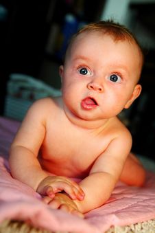 Baby Is Looking With Surprise And Open Mouth Stock Photo