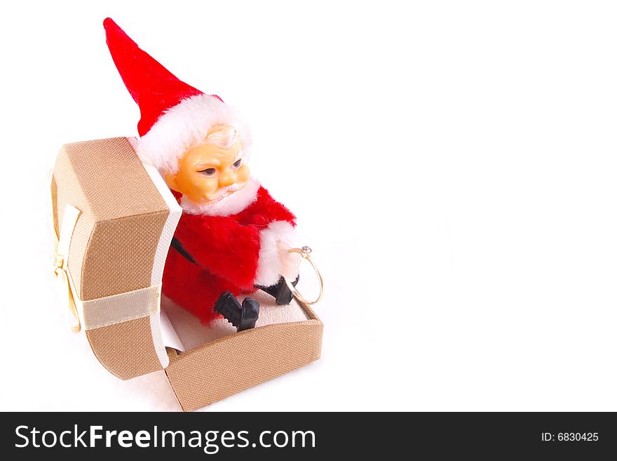 Opened box with santa keeping ring. Opened box with santa keeping ring