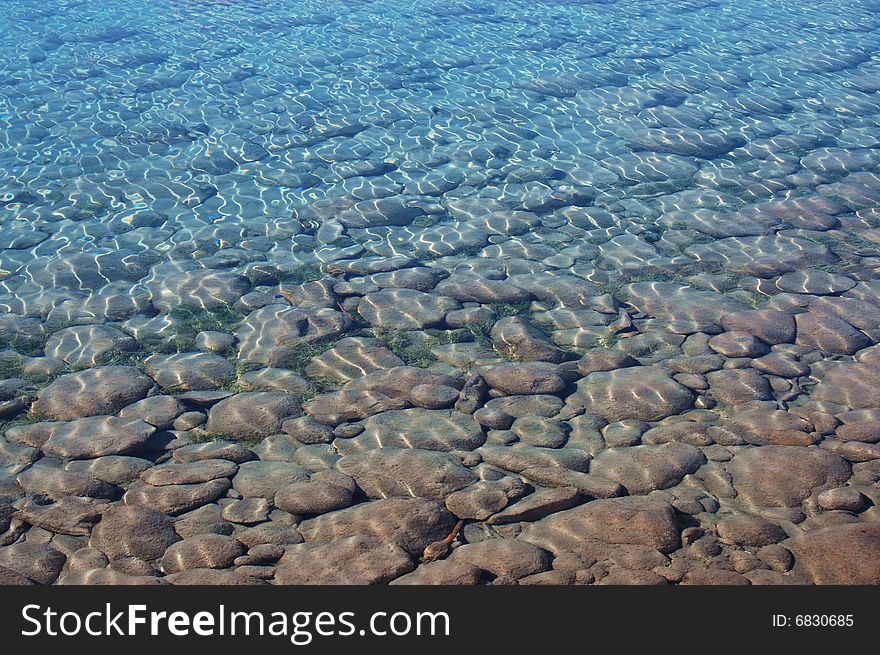 Lake ripples reflecting sunlight off the surface