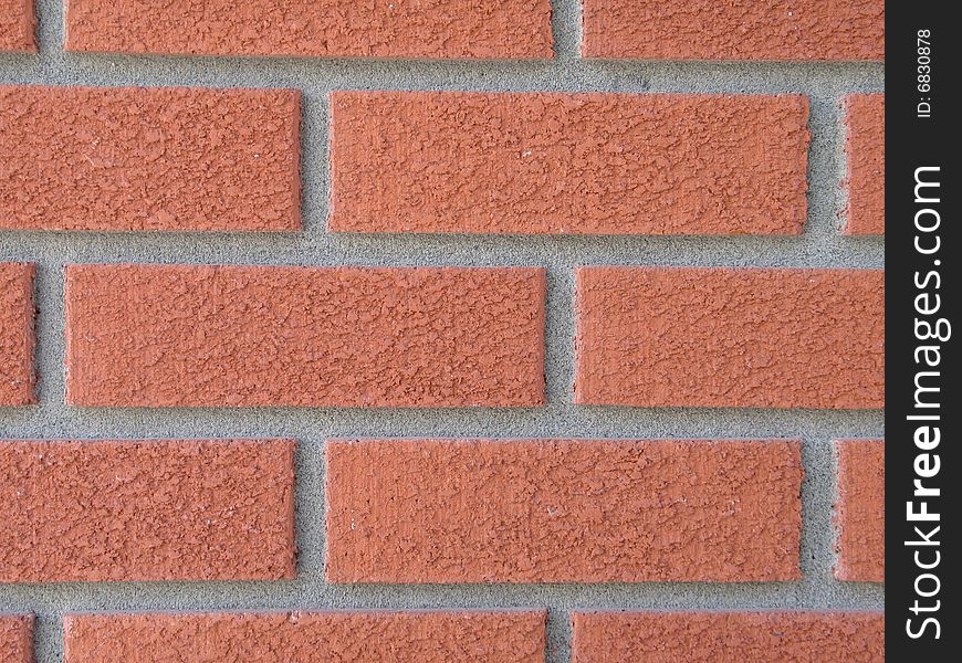 Orange brick wall close up