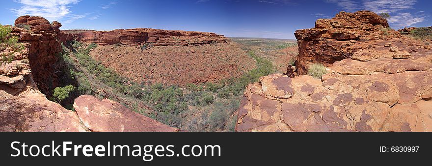 A panorama of the spectacular views over King’s Canyon, Watarrka National Park, Northern Territory, Australia. A panorama of the spectacular views over King’s Canyon, Watarrka National Park, Northern Territory, Australia.