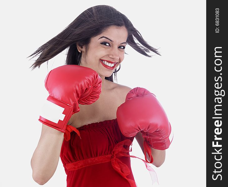 Asian girl of indian origin with red boxing gloves. Asian girl of indian origin with red boxing gloves