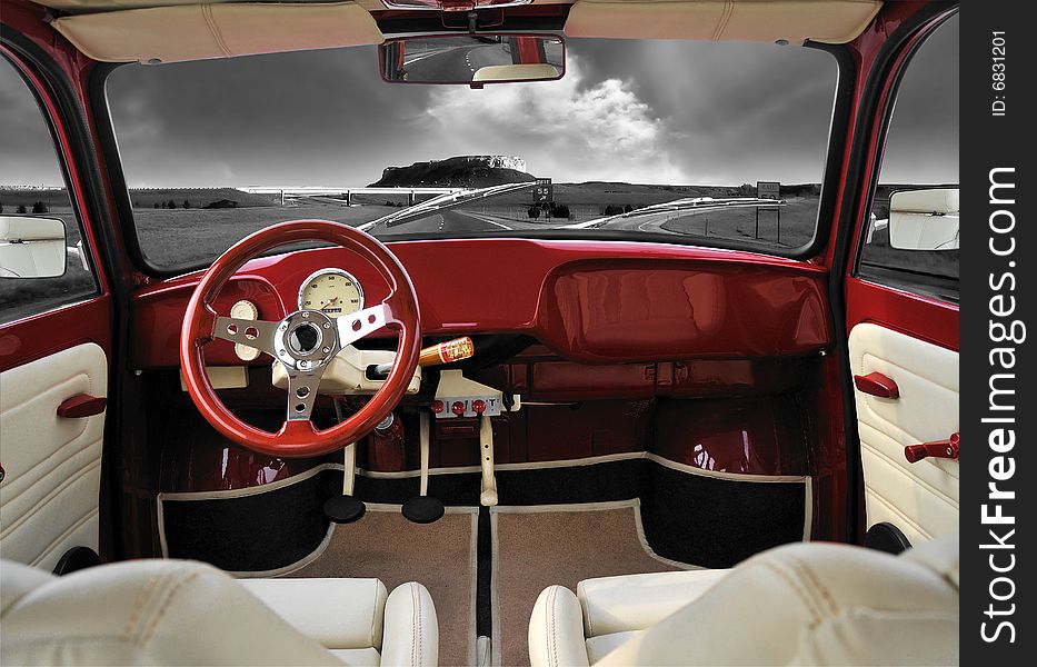 Interior of the red Trabant car on a highway. Interior of the red Trabant car on a highway