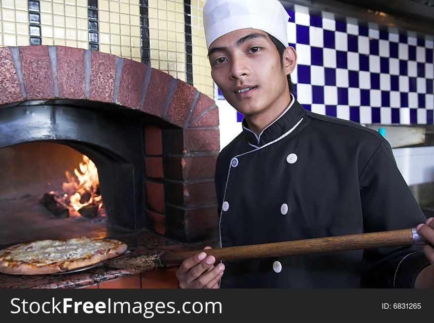 Chef Preparing or cooking pizza food. Chef Preparing or cooking pizza food