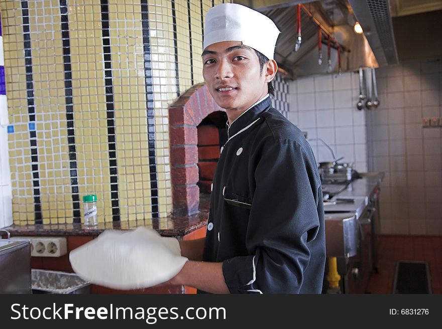 Chef Preparing or cooking pizza food. Chef Preparing or cooking pizza food