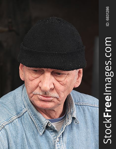 Old man in black hat