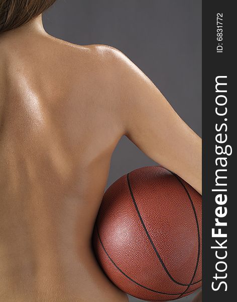 Nude young girl with basketball. Nude young girl with basketball
