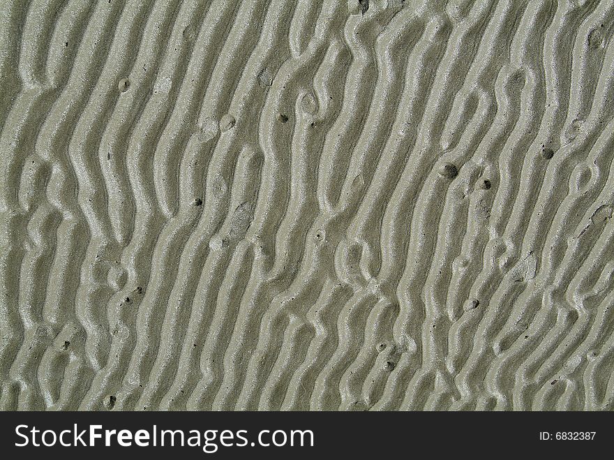 Background with wet grey sand. Background with wet grey sand