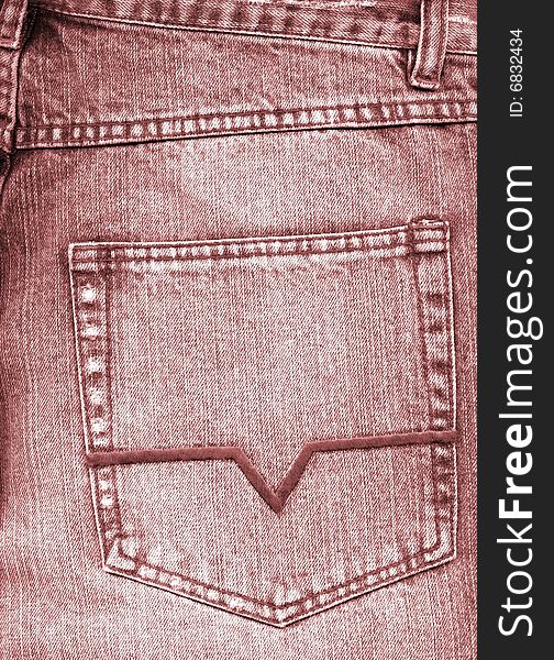 Close-up of old grey jeans pocket