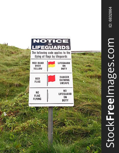 A warning sign about lifeguard rules in kerry ireland. A warning sign about lifeguard rules in kerry ireland