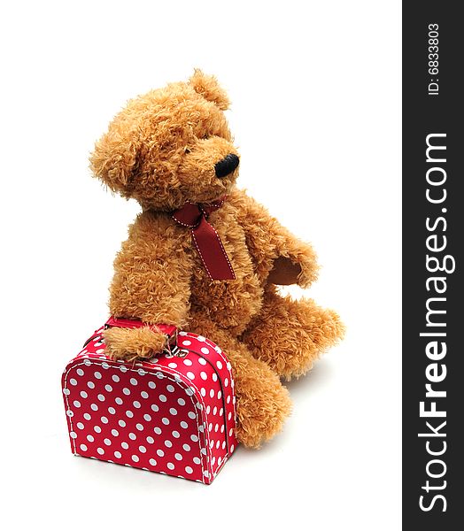 Fun shot of a teddy with his suitcase. Fun shot of a teddy with his suitcase