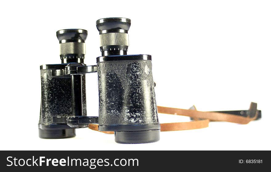 Old binoculars isolated on white