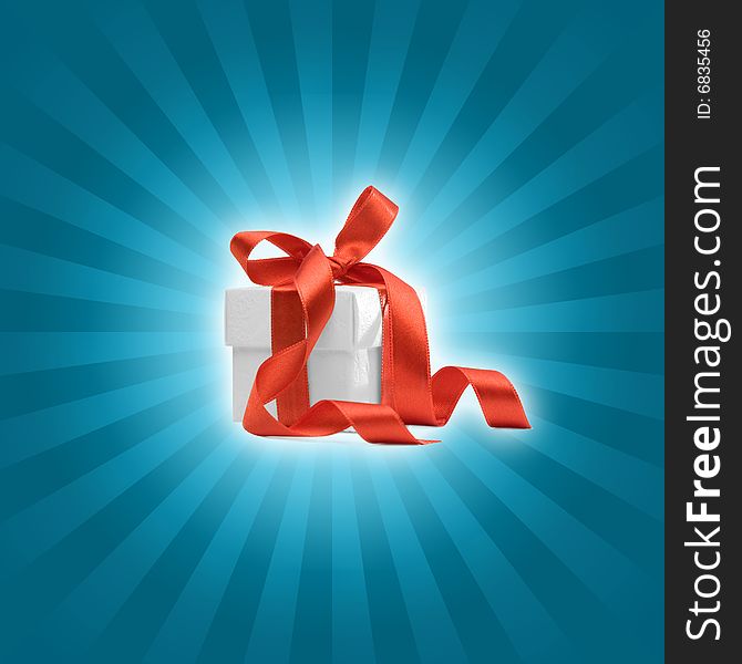 Present box with red ribbon and light blue background. Present box with red ribbon and light blue background