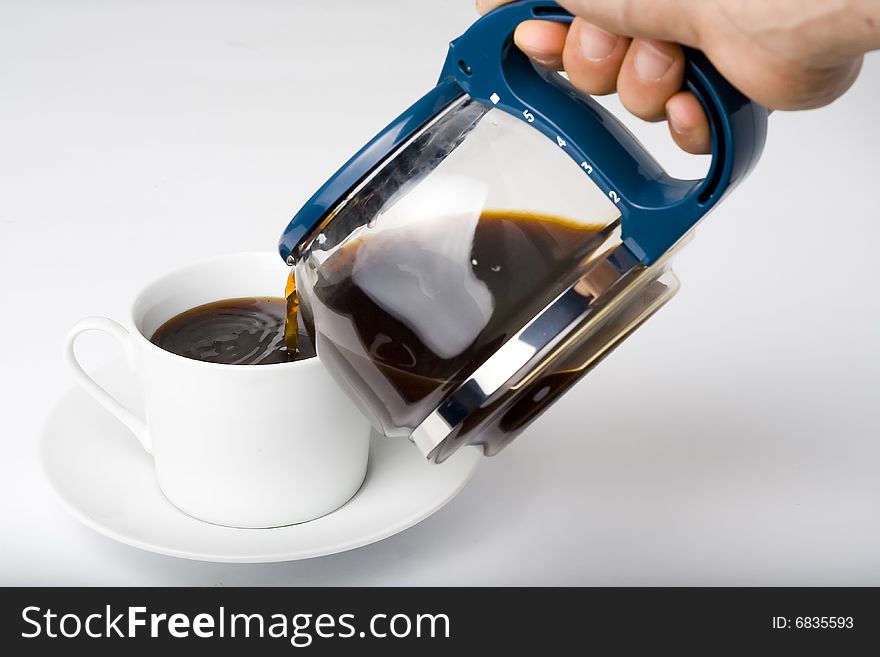 A cup of Espresso coffe isolated over white
