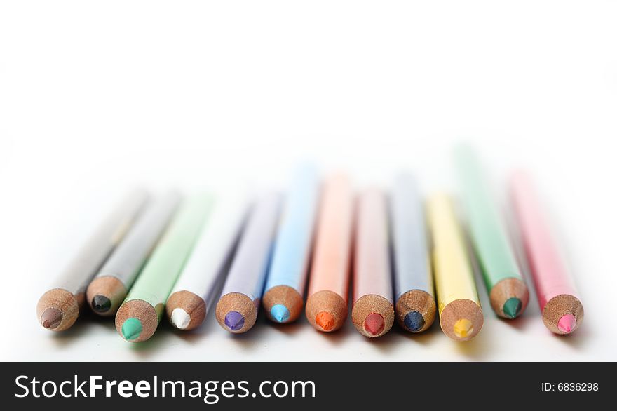 Group of colored pencils isolated on white background