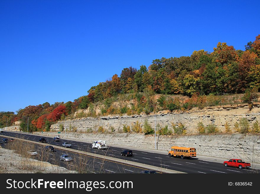 The colorful autumn at highway.