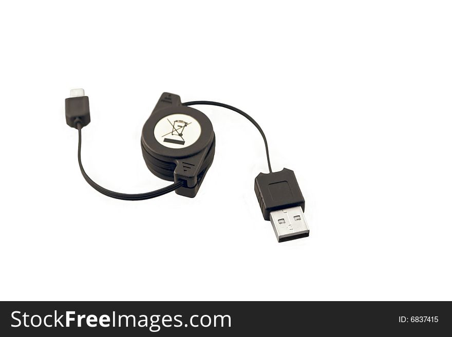 Collapsible usb cable partly extracted, 
isolated on white background.